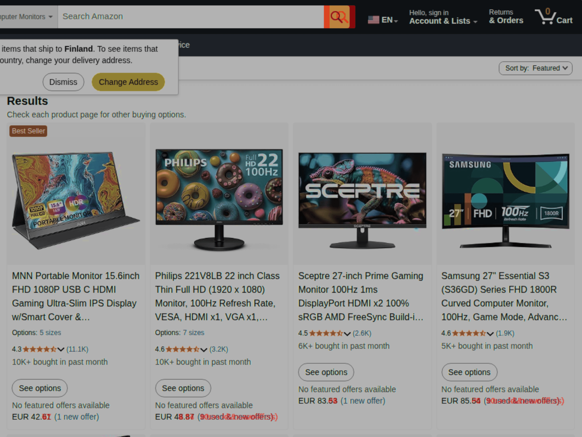 Visual diff overlay of Amazon computer monitors category page showing price changes across four products